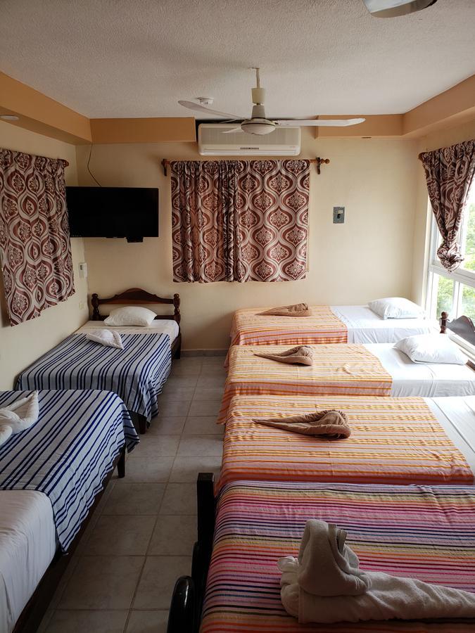 Hotel Cuarto Camino Playa Del Carmen Esterno foto
